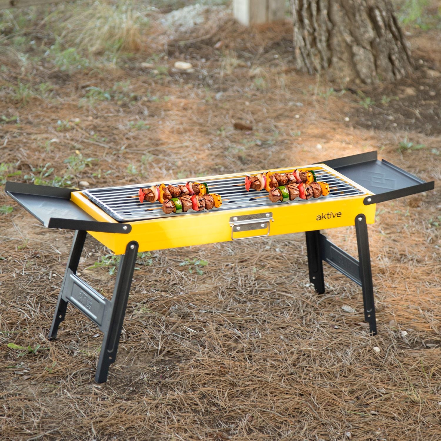 89x22x32 cm foldable charcoal grill, enameled steel, folding side trays and stainless steel grid - Active