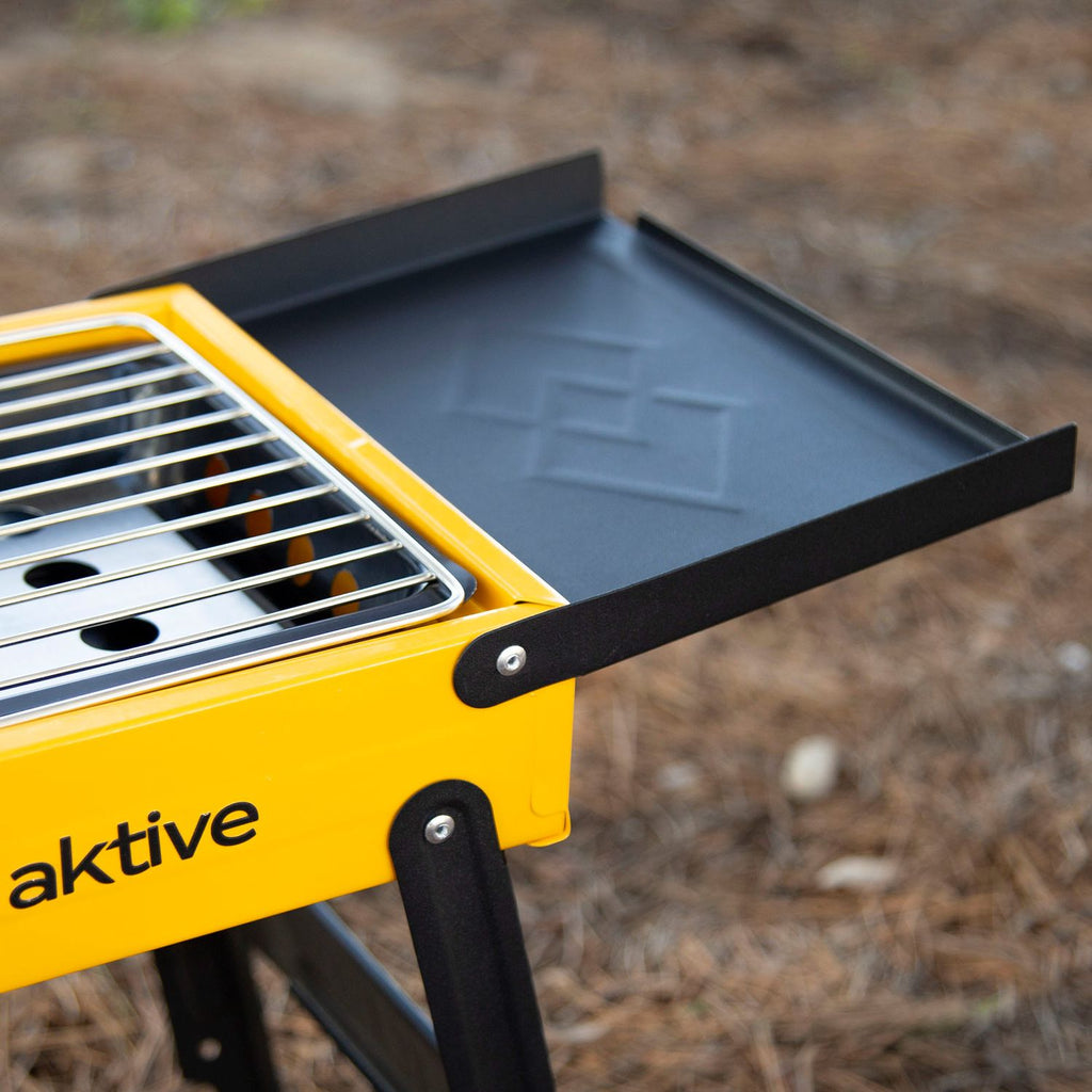 89x22x32 cm foldable charcoal grill, enameled steel, folding side trays and stainless steel grid - Active