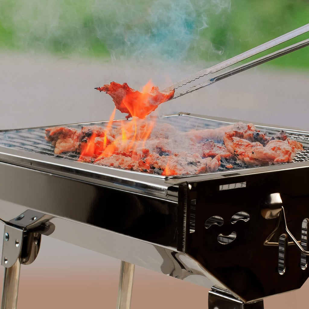 Medium-sized charcoal grill with foldable legs